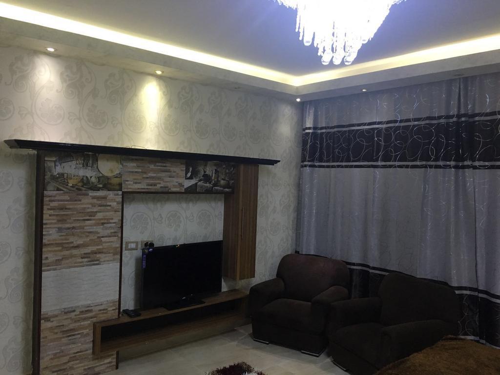 At Milsa Nasr City, Building No. 21 Cairo