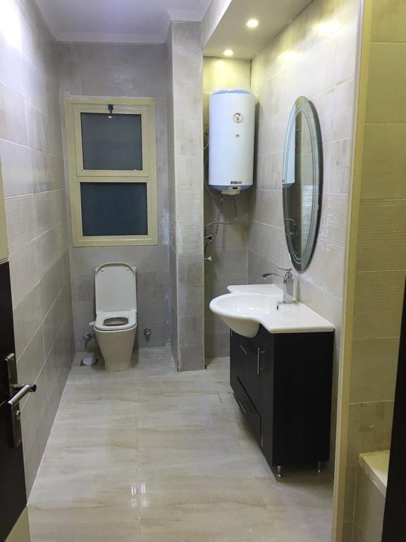 At Milsa Nasr City, Building No. 21 Cairo